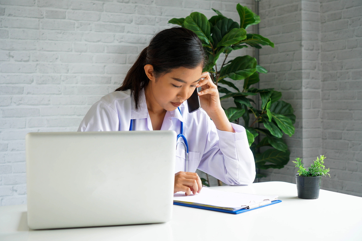 Female Doctor Doing Consultation on the Phone